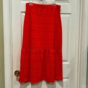 Like new. Coral color skirt.